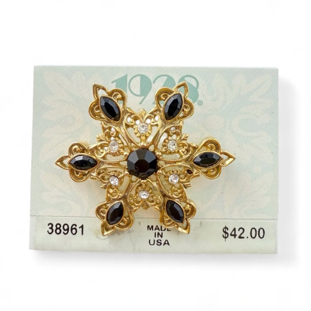 Vintage 1928 Goldtone Snowflake Clear Black Rhinestone Brooch Pin